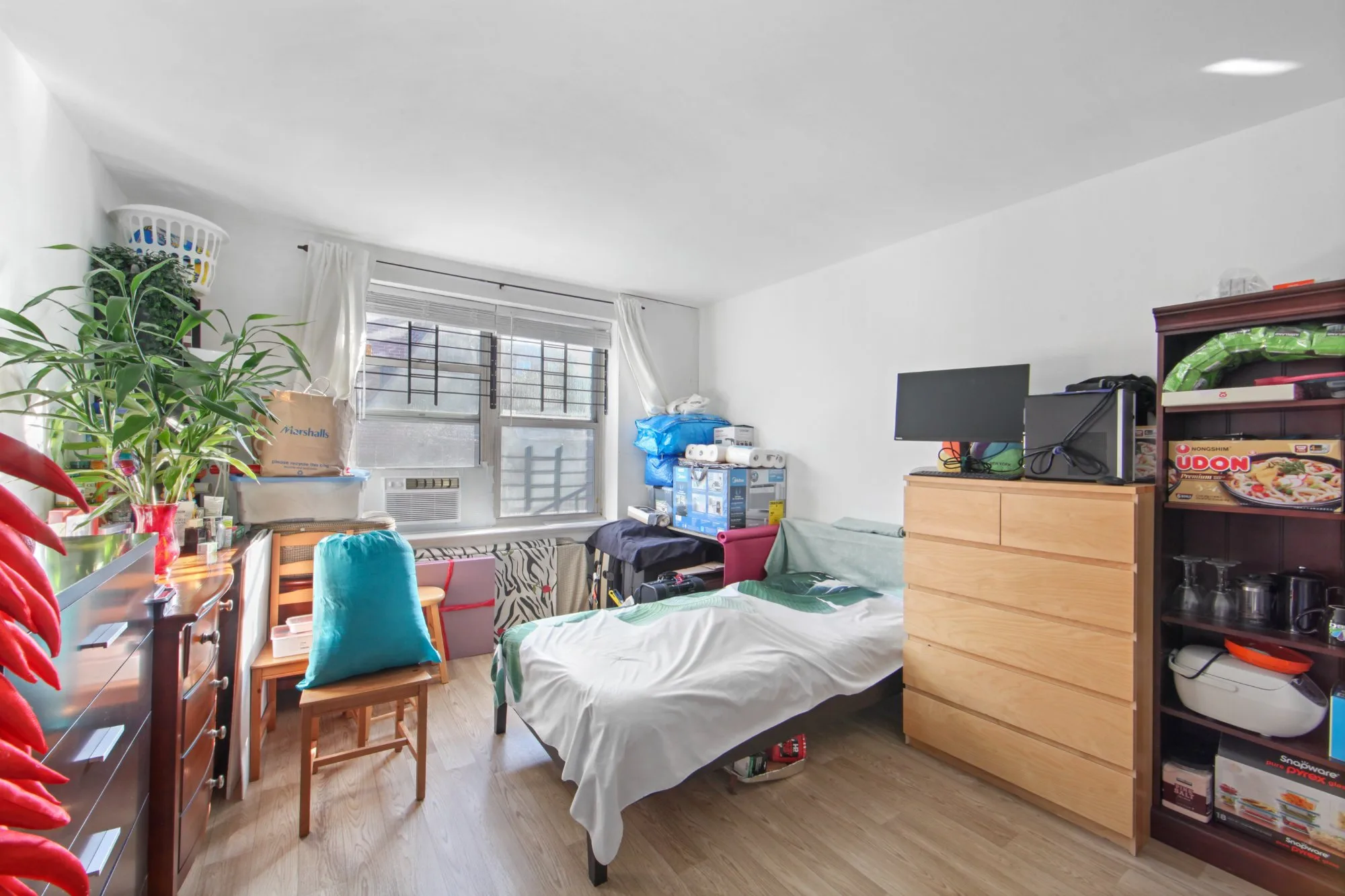 Before declutter - furnished bedroom