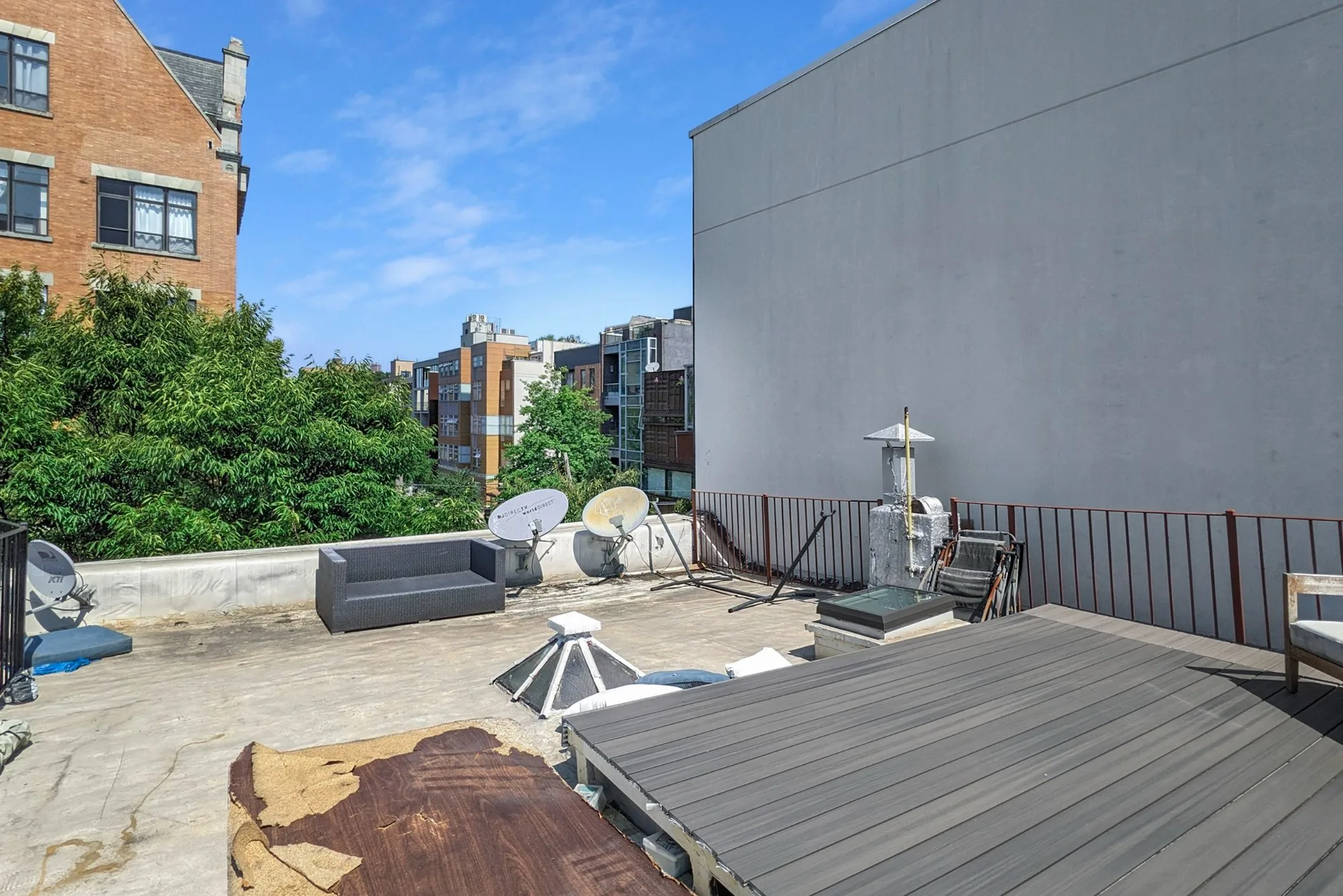 Before declutter - cluttered rooftop