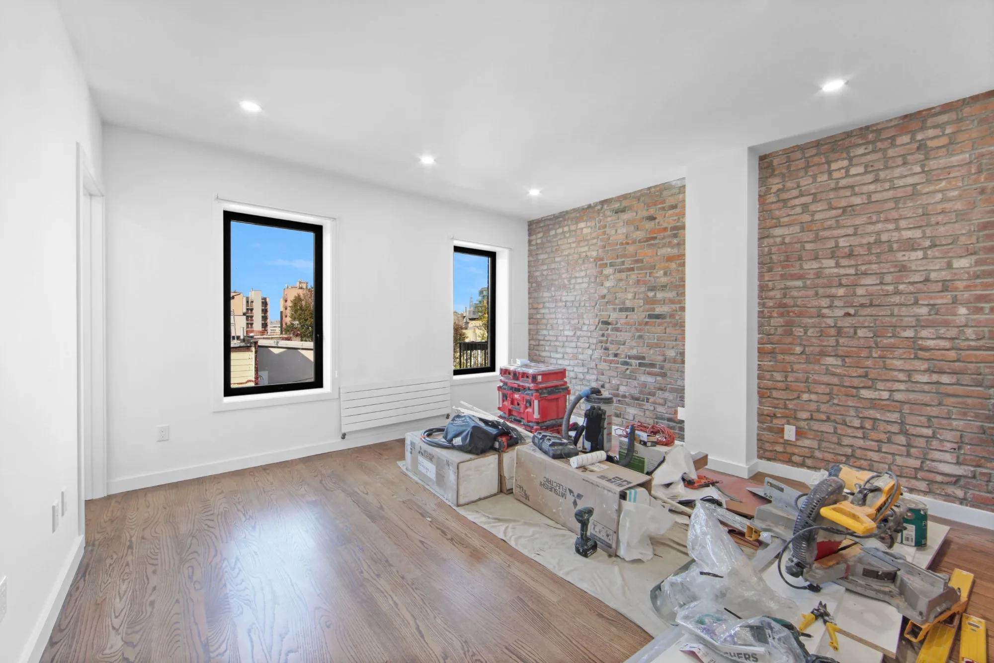 Before declutter - room with construction equipment